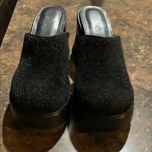 Black platform clogs